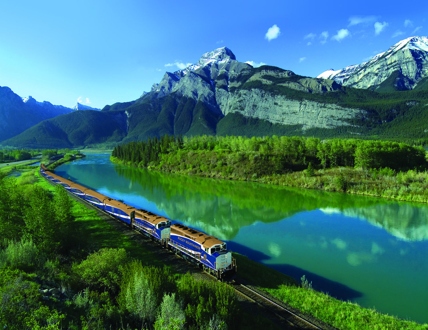 Picture of Rocky Mountaineer train traveling through mountain scenery Picture of Rocky Mountaineer train traveling through mountain scenery